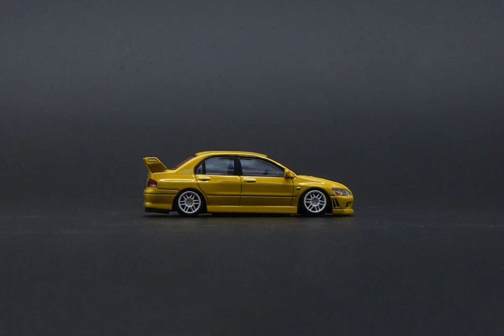 MITSUBISHI LANCER EVO VII (7)(YELLOW) BM CREATIONS 1:64 - Image 10
