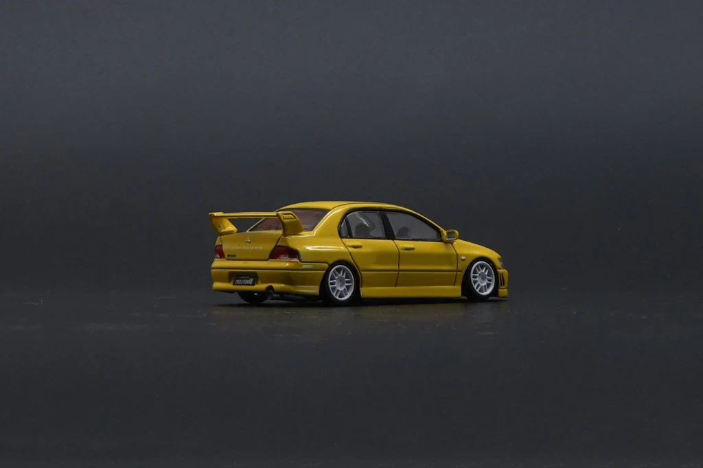 MITSUBISHI LANCER EVO VII (7)(YELLOW) BM CREATIONS 1:64 - Image 9