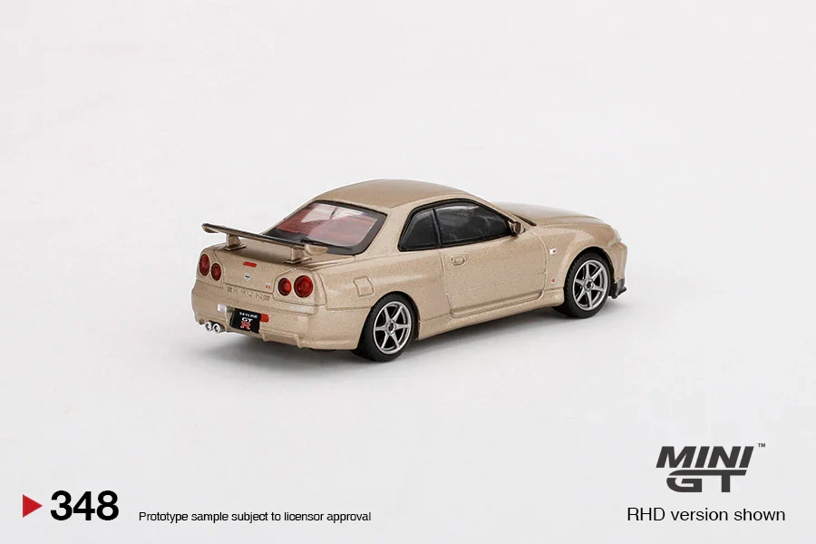 NISSAN SKYLINE GT-R (R34) M-SPEC (SILICA BREATH GOLD) MINI GT 1:64 - Image 2