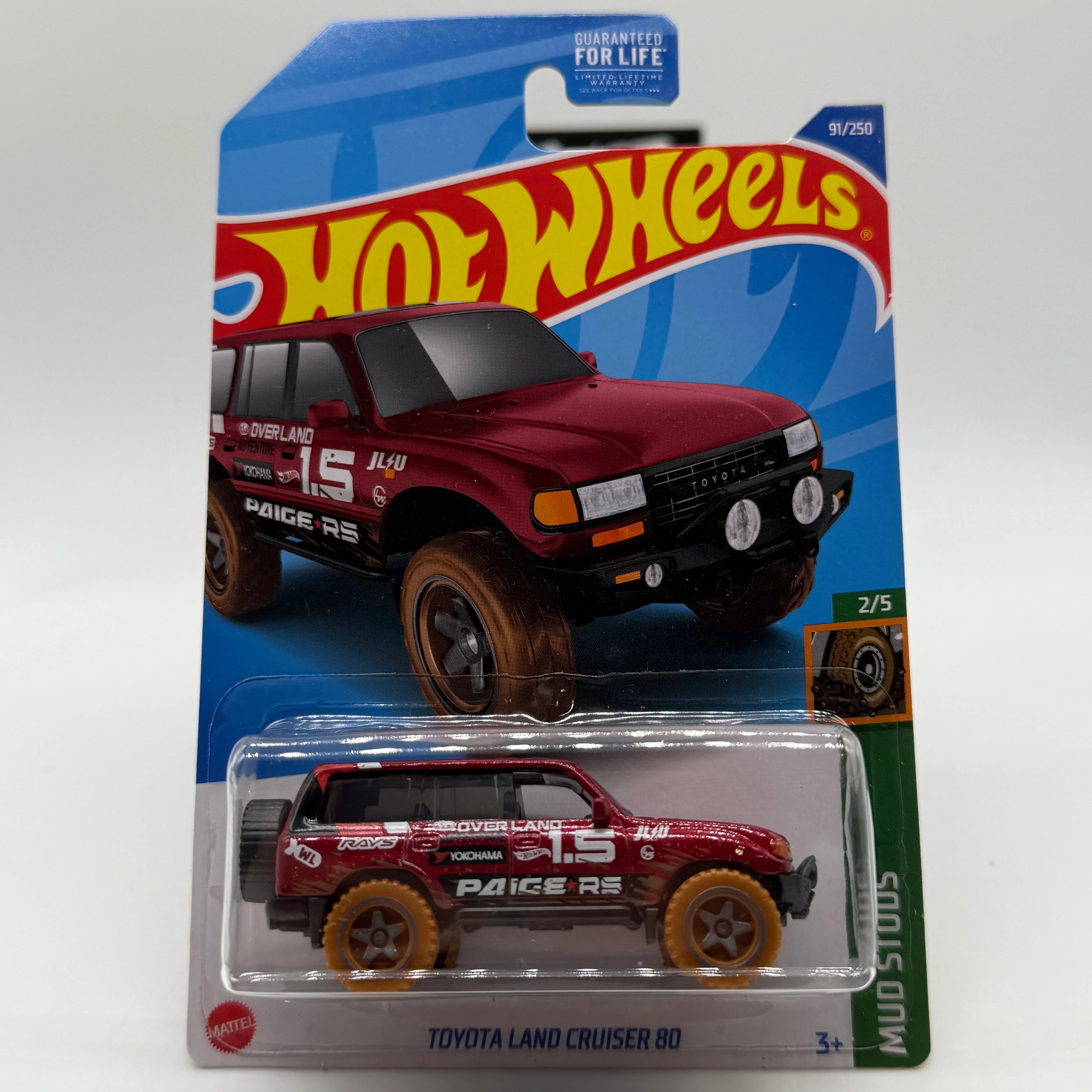Toyota Land Cruiser 80 - Target Exclusive Mud Studs 2/5 Hotwheels *Damaged Blister*